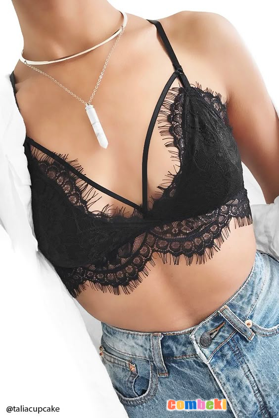 A lightly-lined knit bralette featuring eyelash lace trim, a strappy cutout front, adjustable straps, and a crisscross back.